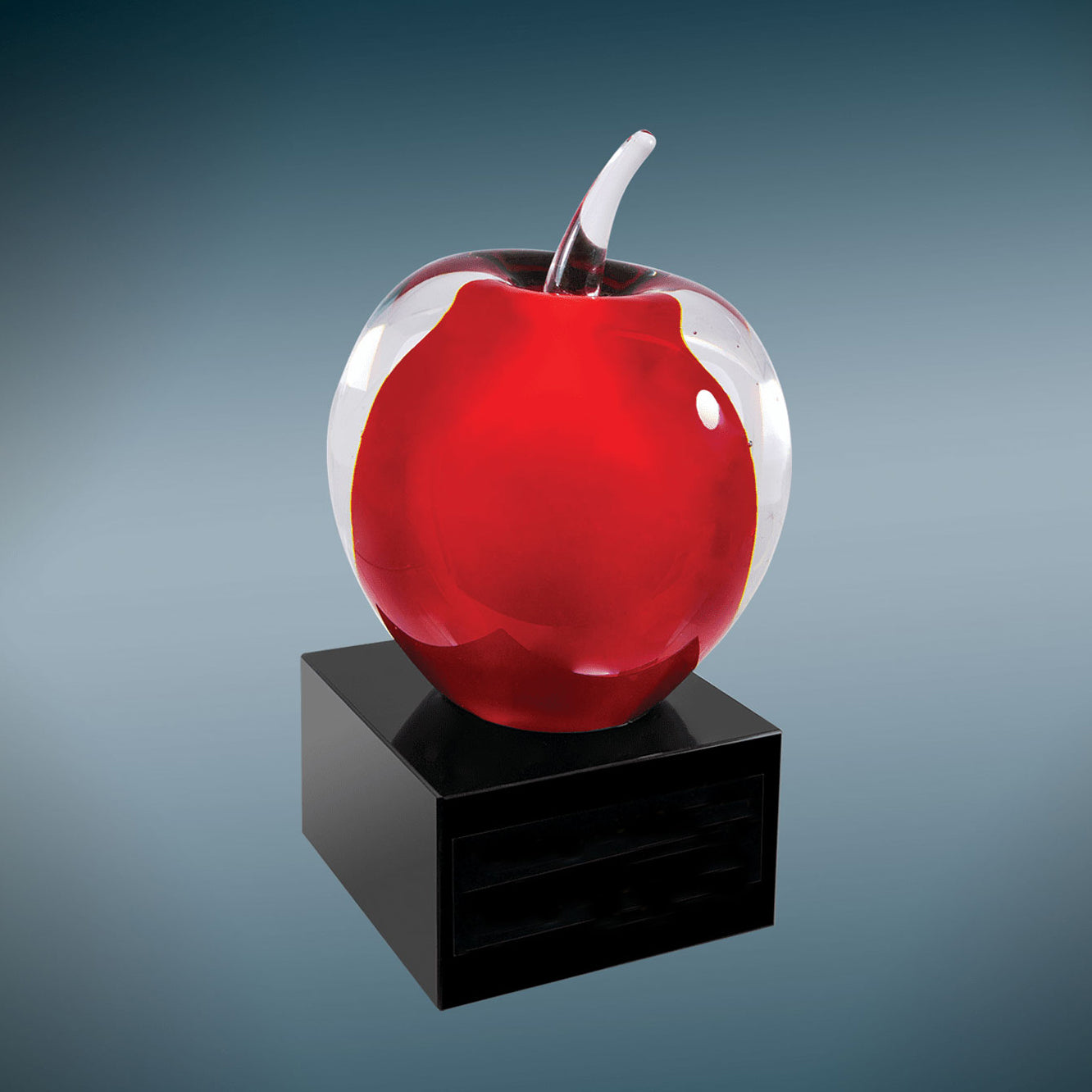 Red art glass apple trophy with custom engraved black marble base and colorfill by Decade Awards
