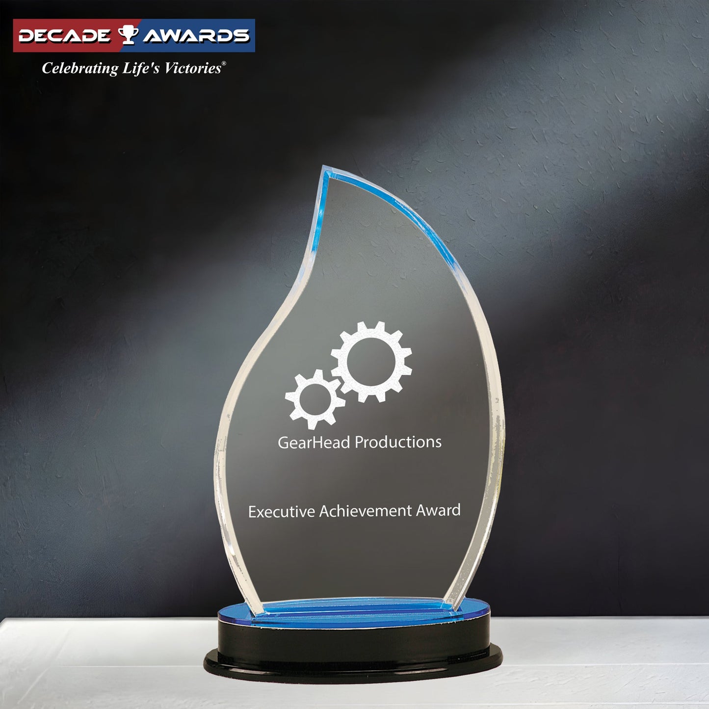 Personalized Blue Flame Impress Acrylic Trophy with custom engraving – 8.25 inch tall corporate recognition award featuring blue accent flame design on a clear base by Decade